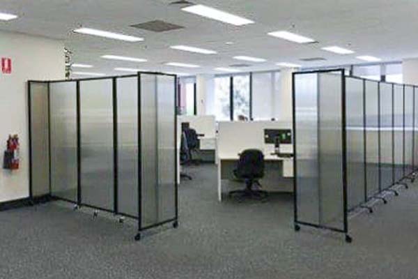 The Benefits Of Using Office Dividers With Doors For Workspace Privacy